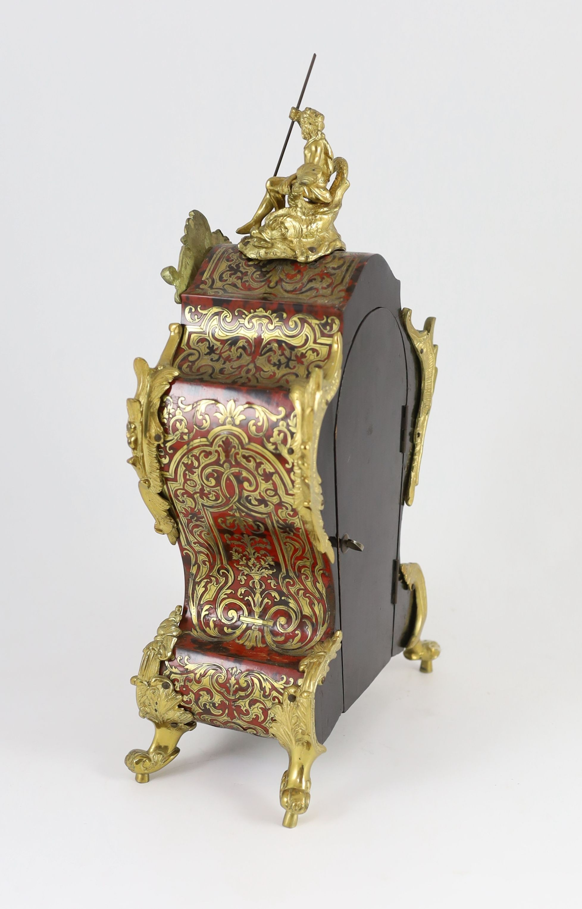 Payne & Co, 162 New Bond Street, London. An early 20th century ormolu mounted red boulle mantel clock, width 20cm, depth 12cm, height 37cm